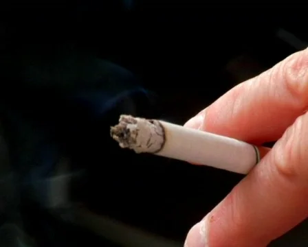 Cigarette in a Lady's Hand Stock Footage 372209