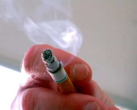 Cigarette in a Lady's Hand Stock Footage 372215