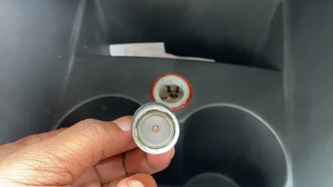 Cigarette lighter coil in the car Video stock 163370563