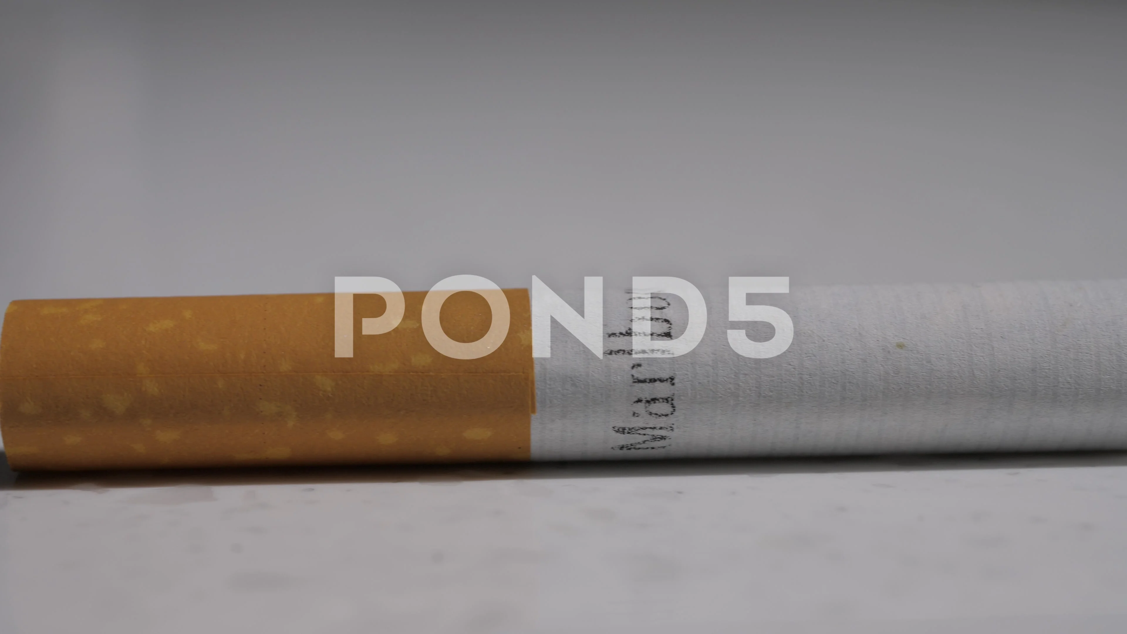 Cigarette - Pan Left