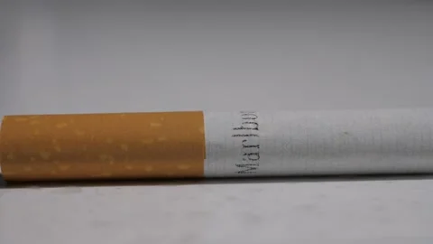 Cigarette - Pan Left - Macro Stock Footage 220085315