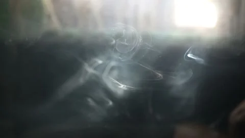 Cigarette smoke with black background. Wisp of cigarette smoke. Stock-Footage 234351050