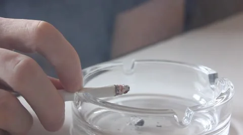 Cigarette smoking and burning in ashtray Video stock 45697257