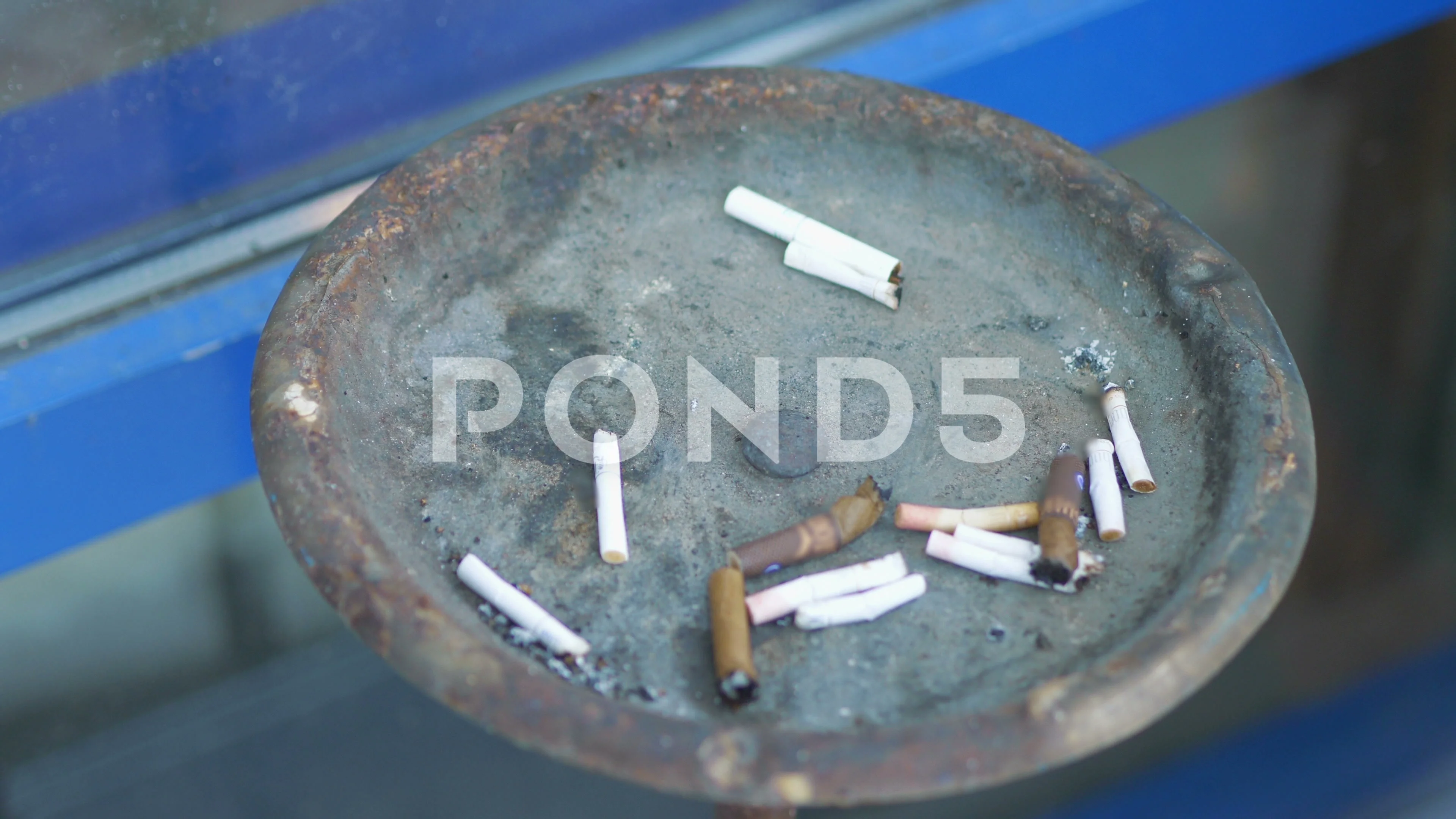 Cigarette sticks in an ashtray in 4k slo, Stock Video