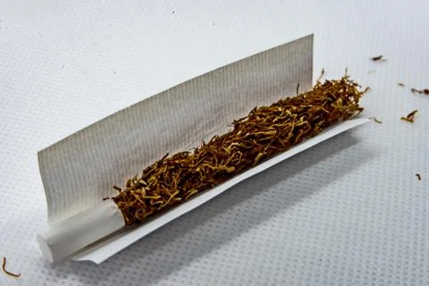 Cigarette to turn on white background Stock Photos