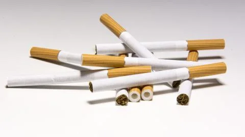 Cigarette on white background Stock Photos