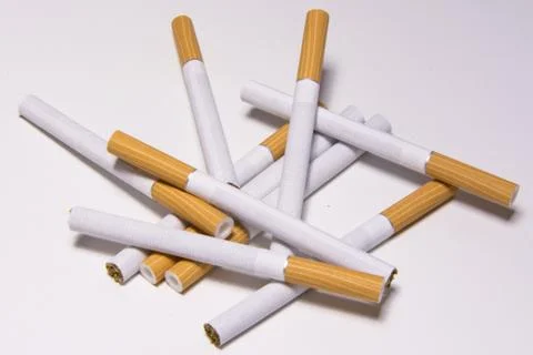 Cigarette on white background Stock Photos