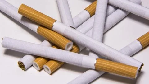 Cigarette on white background Stock Photos