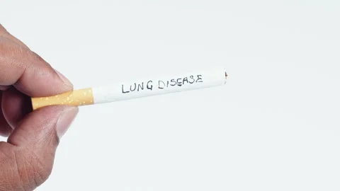 A cigarette with written words Stock Footage 248717562