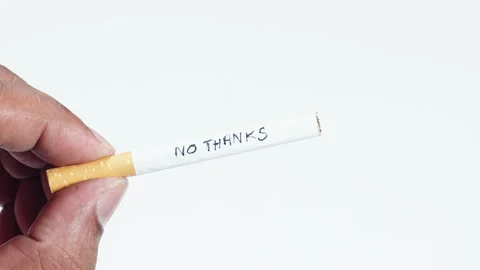 A cigarette with written words No thanks Stock Footage 248718675