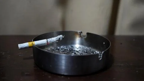 CIGARETTES AND ASHTRAYS Stock Photos