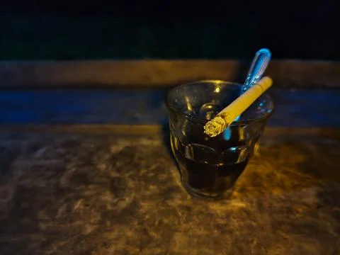 Cigarettes and coffee Stock Photos