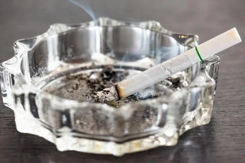 Cigarettes in an ashtray Stock Photos