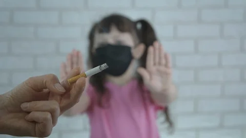 Cigarettes by the child. Stock-Footage 126985719