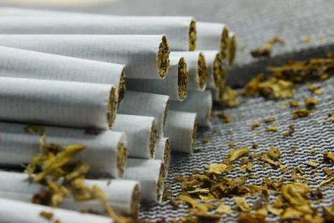 Cigarettes close-up on a gray background Stock Photos