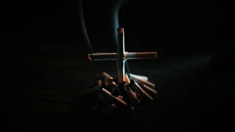 Cigarettes with a cross on the grave Stock-Footage 72192646