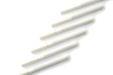 Cigarettes in different position on a white background. 스톡 사진