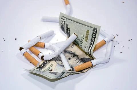 Cigarettes with dollar Stock Photos