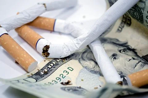 Cigarettes with dollar 写真素材