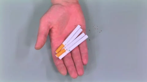 Cigarettes hand squeezes Stock Footage 45136954