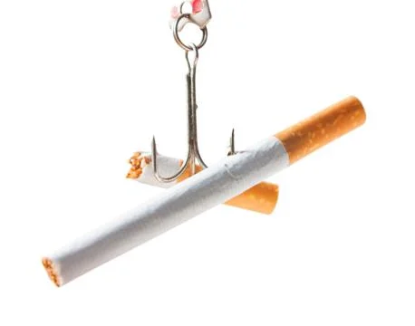 Cigarettes on the hook. Stop smoking Stock Photos