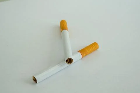 Cigarettes one over another in a white background Stockfoto's