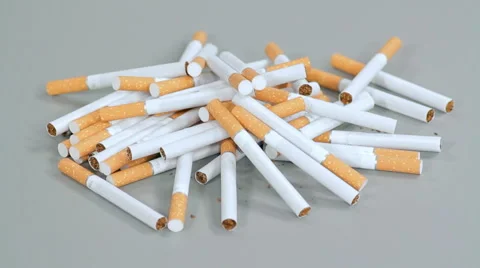Cigarettes scattered on the table Stock Footage 44912302
