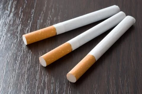 Cigarettes on the table Stock Photos