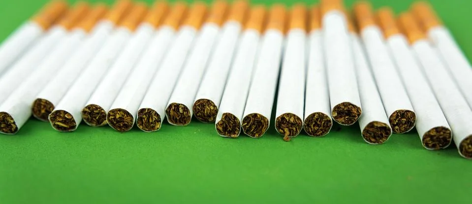 Cigarettes with tobacco close-up. Stock Photos