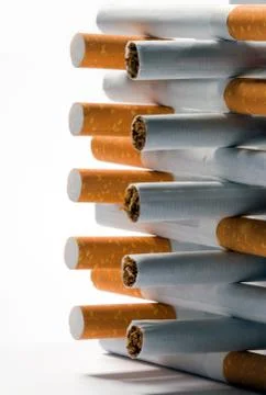 Cigarettes on a white background Stock Photos