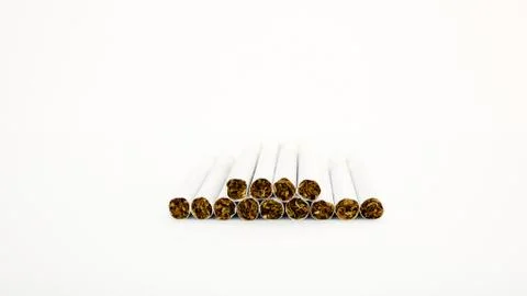 Cigarettes on a white background Stock Photos