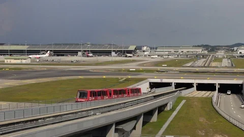 CIMB train which transports passengers between KLIA airport daily. Stock Footage 109239469