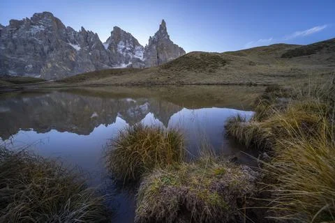 Cimon della Pala reflected in a lake, Rolle Pass, Dolomites, Trentino, Italy, Stock Photos