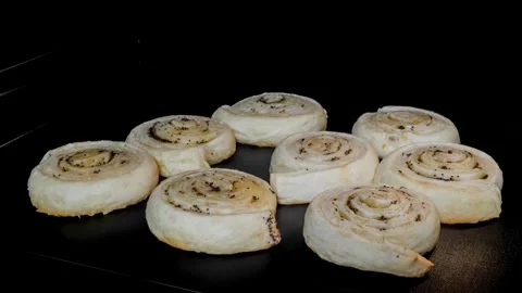 Cinamon Bakery buns baking timelapse. Organic food concept. Popular fast food Stock Footage 336576869