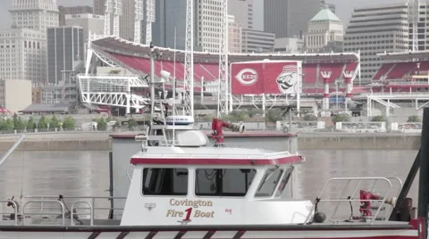 CINCINNATI, FIREBOAT ON OHIO RIVER WITH REDS STADIUM IN BACKGROUND Stock Footage 59184023