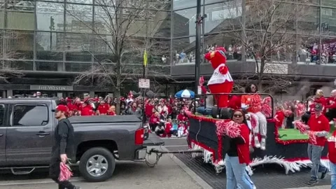 Cincinnati Reds Mascot Gapper on a parade float for the Opening Day Parade 2025. Stock Footage 306202912