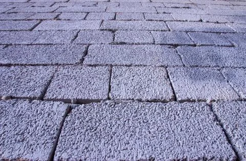 Cinder block brick wall made of concrete as background Stock Photos