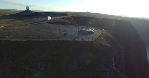 Cinema 4k sideway aerial view, of the metal sphere or globe, in Nord Stock Footage 68585454