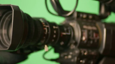 Cinema broadcast TV camera in motion Stock Footage 75825349