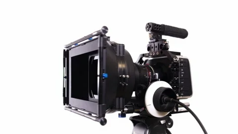 Cinema Camera Professional Gear Rig Follow Focusing and Turning on tripod Stock Footage 229586731