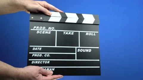 Cinema Clapper Board on Hands | Stock Video | Pond5