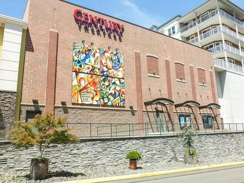 Cinema facade at Point Ruston featuring modern brick architecture, colorful.. Stock Photos