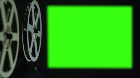 Cinema projector shows green screen Stock Footage