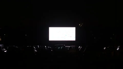 Cinema screen in movie theater cars at night Stock Footage 138221337