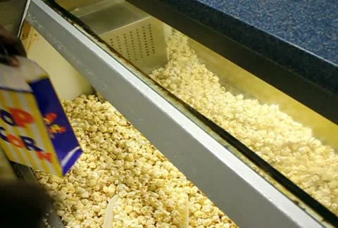 Cinema Serving Popcorn 2 NTSC SD Stock Footage 10795578
