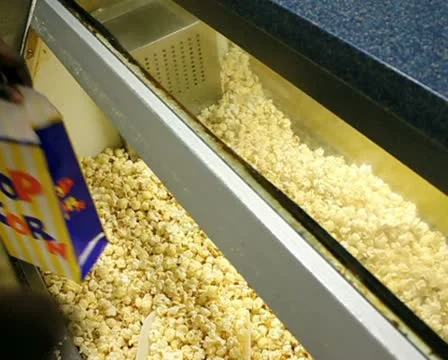 Cinema Serving Popcorn 2 PAL SD Stock Footage 10795580