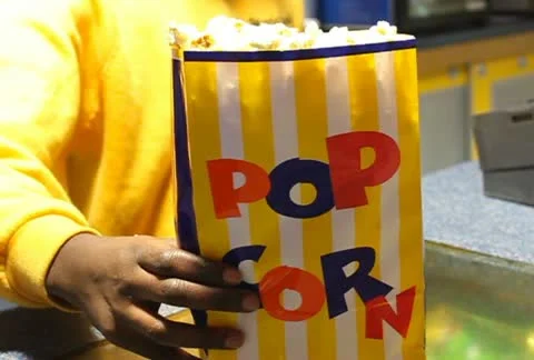 Cinema Serving Popcorn Bumper NTSC SD Stock Footage 10795586