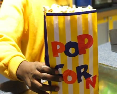 Cinema Serving Popcorn Bumper Pal SD Stock Footage 10795584