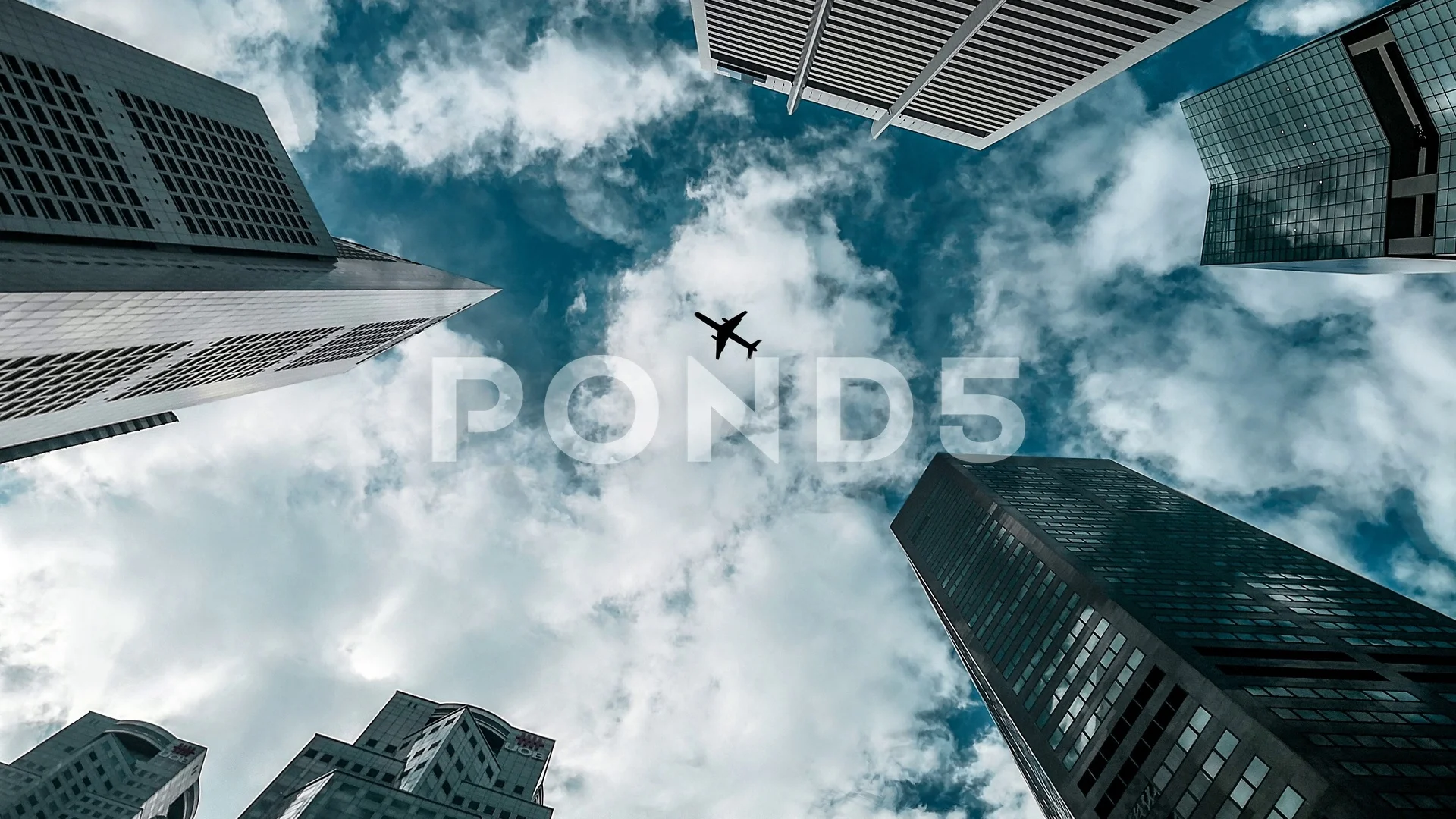 airplane flying over city