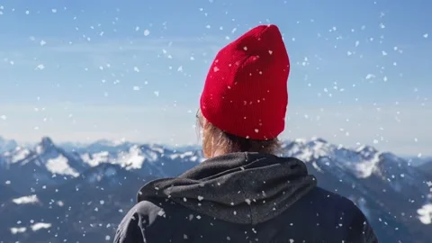 Cinemagraph of backside of man in the mountains in snow Stock Footage 210417968